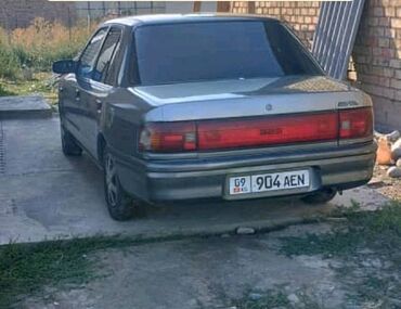 мазда кронуз: Mazda 323: 1992 г., 1.5 л, Автомат, Бензин, Седан