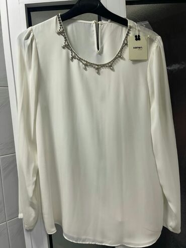 Köynək və bluzalar: Her 1i, 20 ve ya 15 azn cox alana endirim olunacaq, L yaxud xl — 2