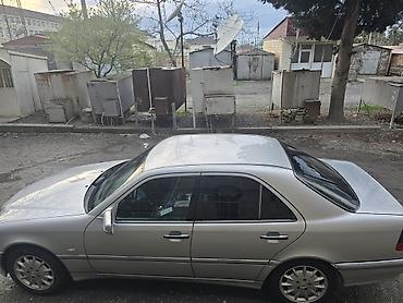 mersedes hissələri: Mercedes-Benz C-Sinif (W202) sedan - Kuzov: 4 qapılı sedan, gümüşü — 1