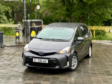 Toyota Prius: 2015 г., 1.8 л, Автомат, Гибрид, Универсал