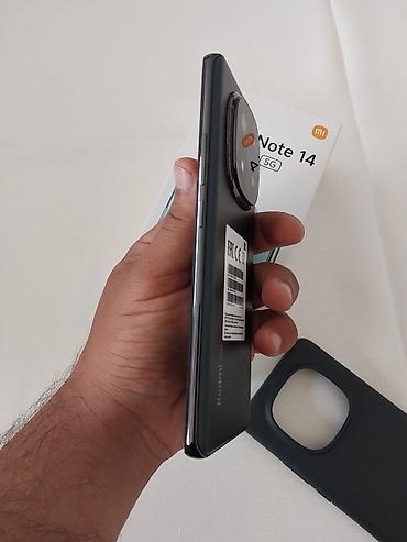 redmi note 8 qara: Redmi Note 14 Pro+, 512 GB, rəng - Boz, İki sim kartlı — 2