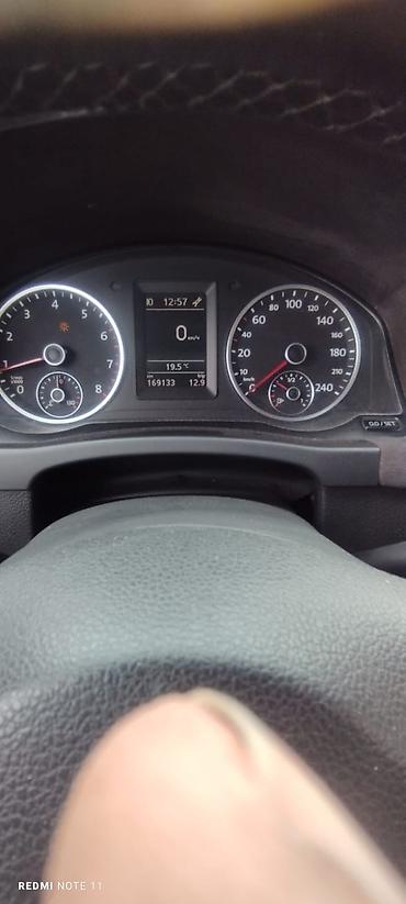 Volkswagen: Volkswagen Tiguan, ağ rəngli, kompakt SUV. Xüsusiyyətlər: - Kuzov: 5 — 7