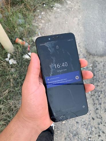 honor 200 lite qiyməti: Xiaomi Mi A2, 128 GB, rəng - Qara, 
 Barmaq izi, İki sim kartlı — 2
