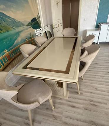 Mebel: Tecili masa dəsti satılır – 550 AZN. • Komplekt: masa + 6 stul • Rəng — 1