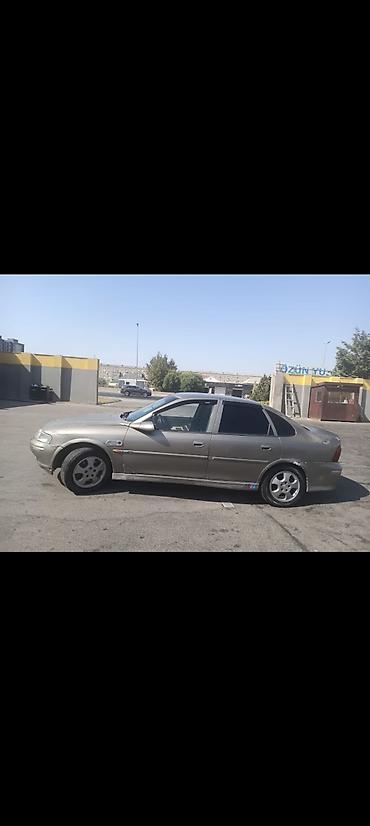 gurcustan avtomobil ehtiyat hisseleri: Opel Vectra B sedan - Korpus: 4 qapılı sedan, boz rəng - Mühərrik və — 1