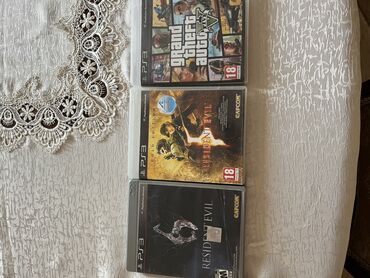 сколько стоит sony playstation 3: PlayStation 3 üçün Grand Theft Auto V, Resident Evil 5 və Resident