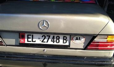 Mercedes-Benz - αριστερά - Πρέσπες: Mercedes-Benz E 200: 2 l. | 1989 έ. | Sedan