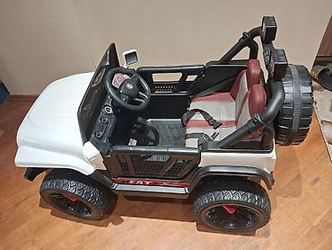 Детские электрокары: Uşaq elektrikli jeep maşını yeni kimidi az istifadə olub - Korpusu — 2