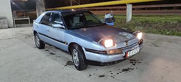 Mazda: Mazda 323: 1996 г. — 1