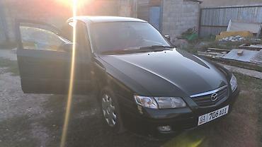 х2 00: Mazda 626: 2000 г., 2 л, Механика, Бензин, Седан — 4