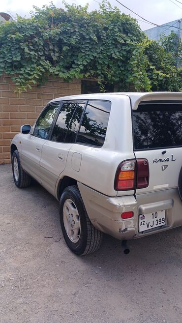 Toyota: Toyota RAV4: 2 l | 1998 il Krossover — 3