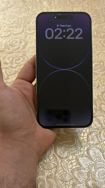 iphon se: IPhone 14 Pro Max, 256 GB, Deep Purple, Barmaq izi, Face ID, Simsiz şarj — 1