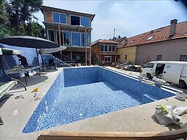 Građevinarstvo i rekonstrukcija: Izrada BAZENA: – Široki mašinski iskop – Ravnanje poda i stranica – — 1