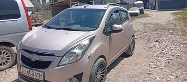 ош нексия 2: Хэтчбек Chevrolet Spark, представленный в светлом цвете, обладает