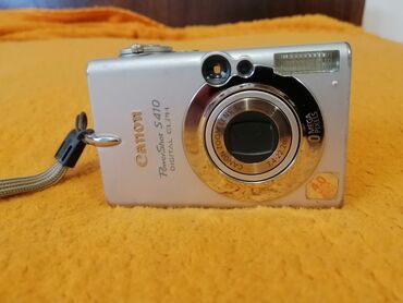 Canon PowerShot S410 rəqəmsal fotoaparatı kompakt dizaynı və metal