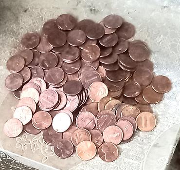 Sikkələr: 150 ədəd ABŞ 1 senti - ABŞ-da, əmək haqqının yüksək olması və kard — 4