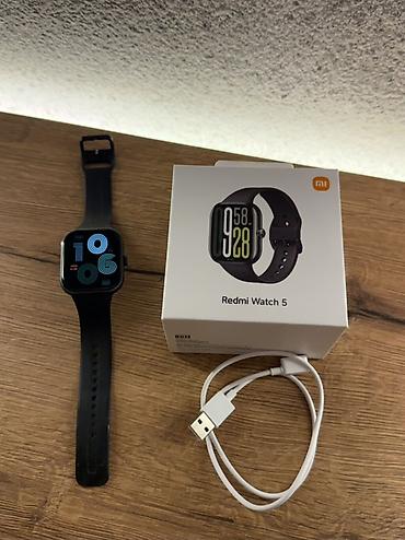 tesla charger: Redmi Watch 5 Obsidian black. 3 aydır almışam, 550 mah batareya — 1