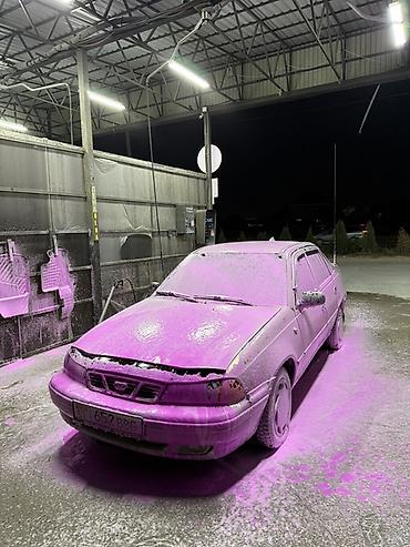 тонировка авто: Услуги тонировки автомобилей. На фото показан процесс выполнения — 3