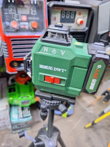 штатив для нивелира: Лазерный уровень DWT в прочном зеленом корпусе предназначен для