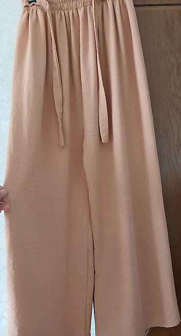 Bej rəngli qadın kulot şalvar - Model: geniş kəsimli, culotte stil -