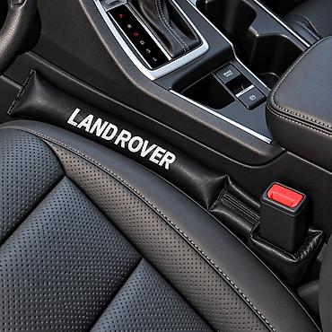 lizing avtomobiller: Land Rover yazılı oturacaq arası boşluq doldurucusu — qara Land Rover — 2