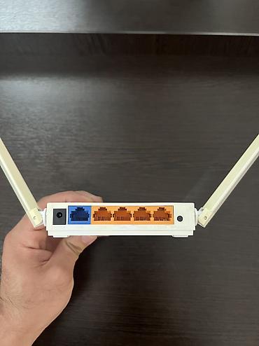 Модемы и сетевое оборудование: Wifi роутер Tp link с 4 портами на 300мб В хорошем состоянии, все — 4