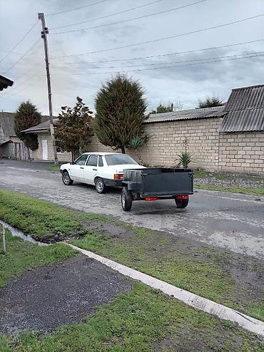 dort tekerlekli motor: Qoşqular – möhkəm metal karkas və taxta döşəmə ilə. Xüsusiyyətlər: - — 6
