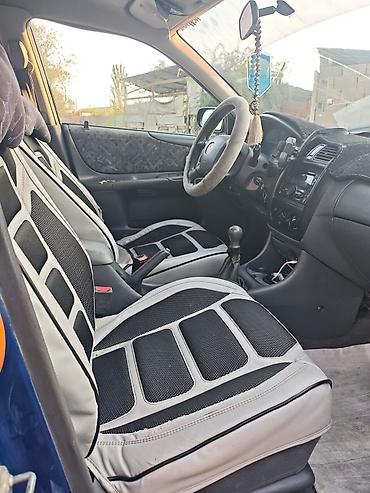 х трейл: Mazda Familia: 2000 г., 1.5 л, Механика, Бензин, Хэтчбэк — 8