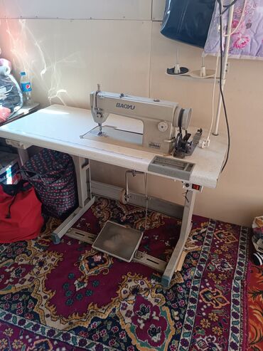 механики швейных машин: Швейная машина Автомат