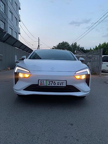 Другие автомобили: Электромобиль в синем цвете, модель 2024 года, обладает современным — 15