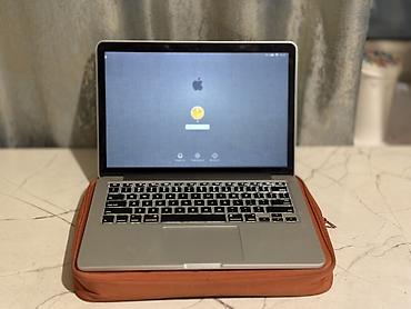 Ноутбуки Apple (MacBook): Apple MacBook Pro 13" Характеристики: - Процессор: 2.5 ГГц Intel Core — 2