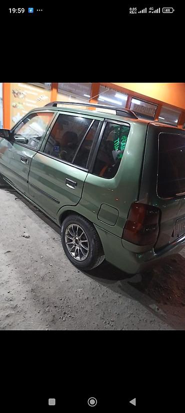 cx 9: Mazda Demio: 2000 г., 1.5 л, Автомат, Бензин, Минивэн — 2