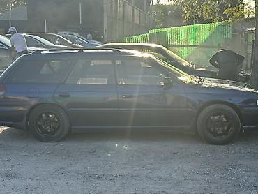 амартизаторы: Subaru Legacy: 1997 г., 2.5 л, Автомат, Бензин, Универсал — 4