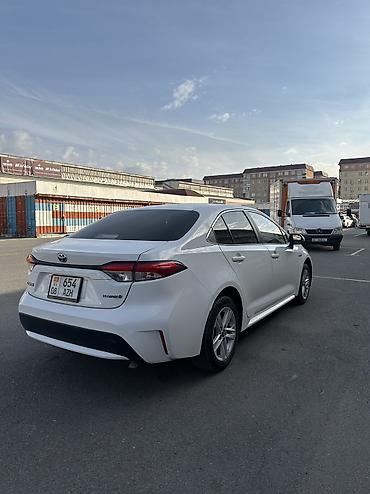 купить витц: Toyota Corolla: 2022 г., 1.8 л, Вариатор, Гибрид, Седан — 7