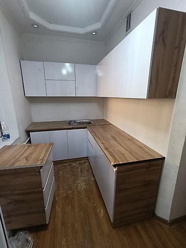 Кухонные гарнитуры: Угловой кухонный гарнитур в современном минималистичном стиле - — 5