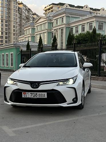 byd e2: Toyota Corolla: 2021 г., 1.8 л, Вариатор, Гибрид, Седан — 2