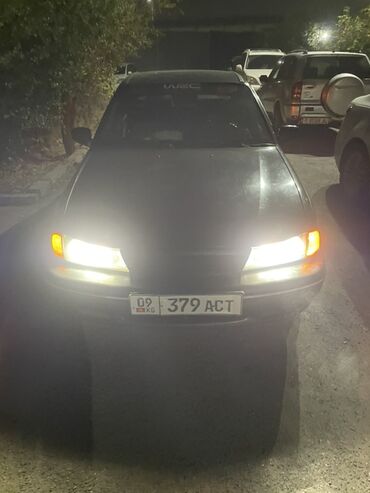 меняю дом на авто: Седан черного цвета с киргизскими номерами 09 KG 379 ACT. Основные