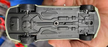 Avtomobil modelləri: Коллекционная модель Maserati Quattroporte V light green 2005 — 14