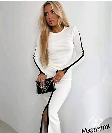 Kompleti: 🔥Zenski dvodelni komplet – džemper i suknja midi dužine
✅2200 din — 4