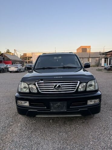 шины на lx570: Полноразмерный внедорожник Lexus LX 470 в черном цвете. Модель