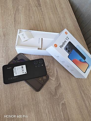 купить сяоми 12: Redmi 12, 128 ГБ, цвет - Черный, С документами — 1