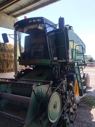 арык бетонный: Комбайн John Deere с жатками Описание: - Зерноуборочный комбайн John — 7