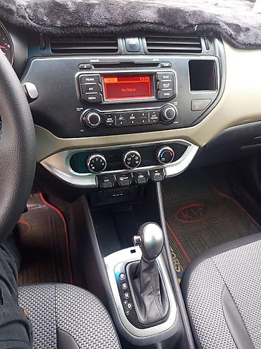 kia march: Kia Rio: 1.6 l | 2014 il Sedan — 1