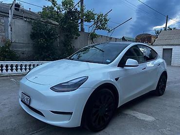 performance: Tesla Model Y: 2023 г., 4.4 л, Автомат, Электромобиль, Кроссовер — 1