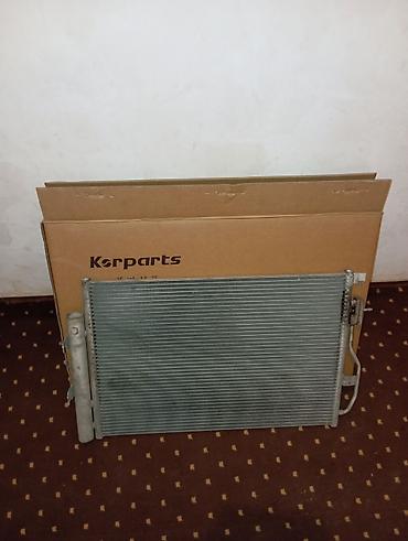 aluminum radiator: Chevrolet Cobalt 2024 zavod üstən çıxma kandisaner radiyatoru tam — 2