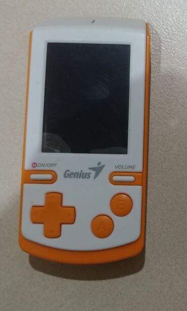 приставки: Игровые консолы Genius Карманное игровое устройство от компании