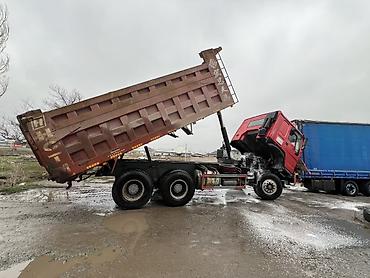 Другой строительный транспорт: Самосвал HOWO (CNHTC), красный, колесная формула 6x4. Основные — 18