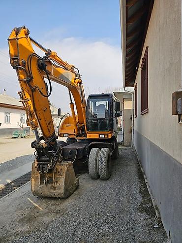 Экскаваторы: Экскаватор, Samsung, 1998 г., Колесный — 23