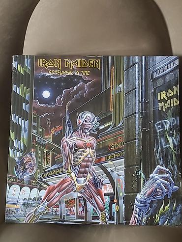 koz utusu: Vinil val, Rok, 1986 il, Ünvandan götürmə — 1