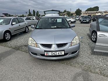 Mitsubishi: Mitsubishi Lancer: 2003 г., 1.6 л, Механика, Бензин, Универсал — 6